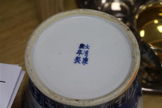 A late 19th century Chinese blue and white lidded baluster vase